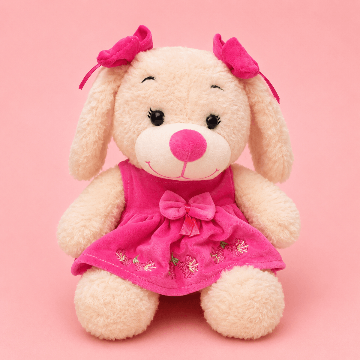 PERRITA CON LAZO Y VESTIDO FUCSIA