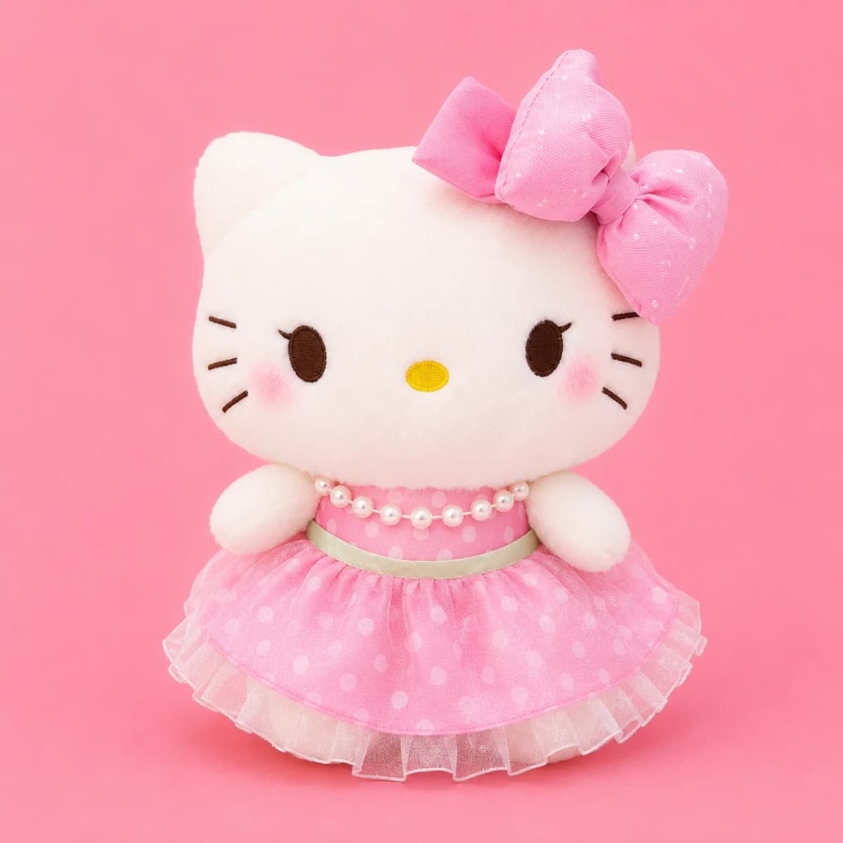 HELLO KITTY CON VESTIDO Y COLLAR DE PERLAS